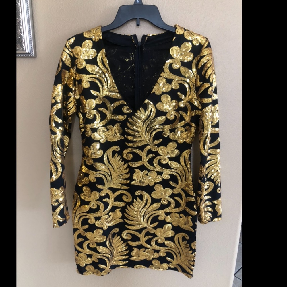 Gold womans dress good condition size XL